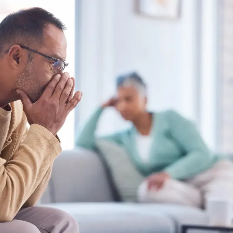 Thinking divorce and old couple with financial stress money problems or fighting about mortgage bills at home divorce depression or frustrated old man with a senior partner after argument on sofa, TMS for Anxiety